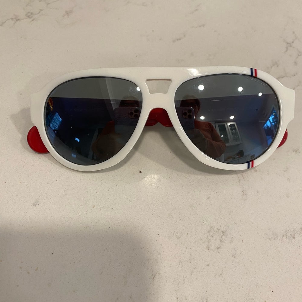 Stylish White Sunglasses with Red Accents
